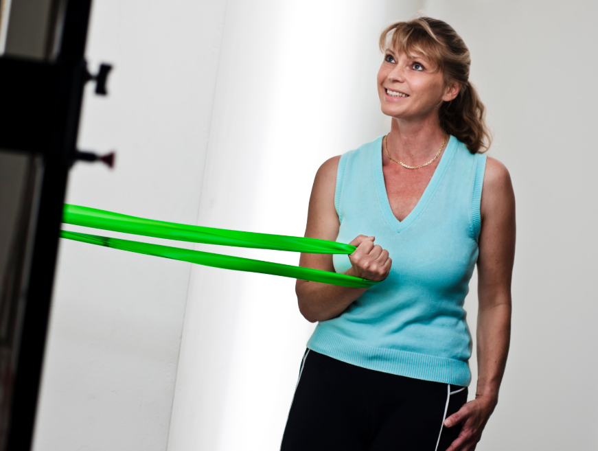 Rotator cuff exercise using Theraband